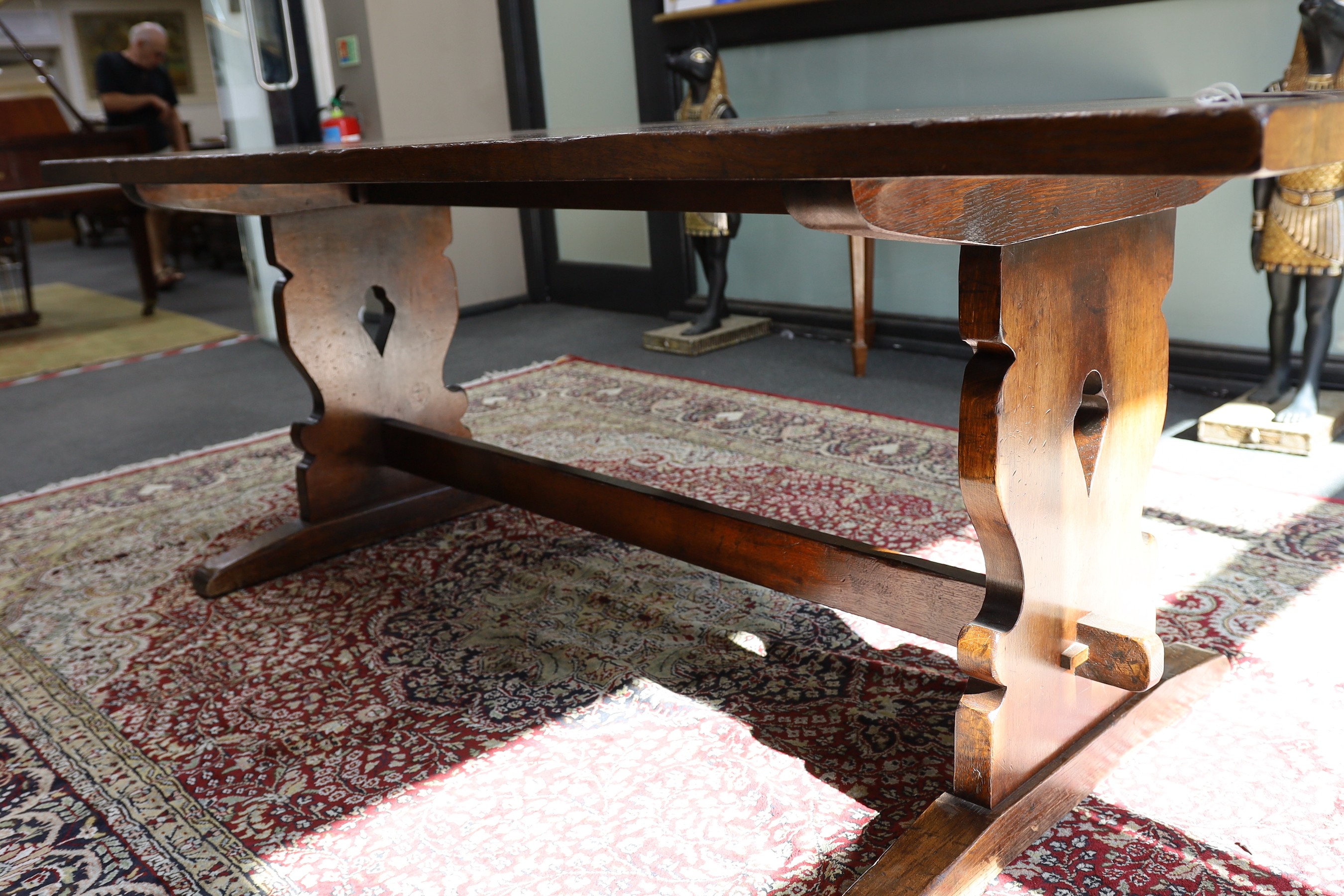 A Titchmarsh and Godwin rectangular oak refectory dining table, length 213cm, width 90cm, height 78cm